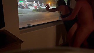 Sex against the hotel window with people walking by