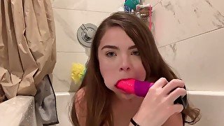 Fucking myself in the tub with a huge dildo