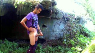 Outside in old ruin jerking with condom