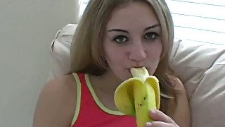 Blonde amateur white girl is seductive even when she eats banana