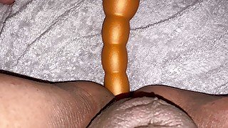 Taking a long butt plug