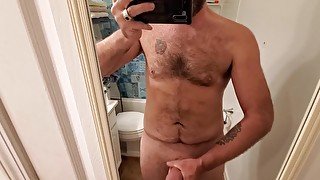 Rubbing my hard cock and shooting load on mirror