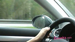 Zuzinka drives a car and masturbates her pussy