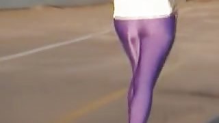 Bright lilac pants on the long legs of candid running babe 03zh