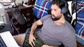 Hot guy teases himself while watching porn