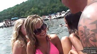 Beer drinking babes look hot at boat party