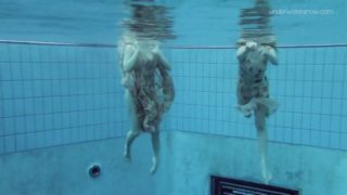 Two hot hairy beauties underwater