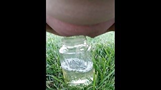 Pissing in jar