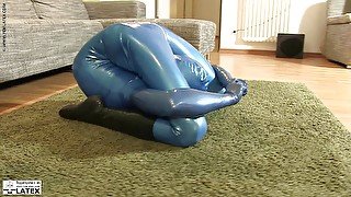 She enjoys the tight horny feeling of rubber during flexible posing