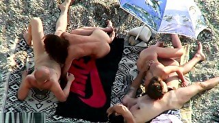 swingers at the beach