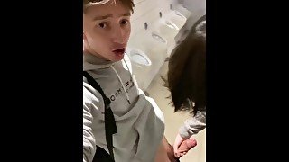 The boy sucks a big dick in the bathroom in the cinema and make me cum