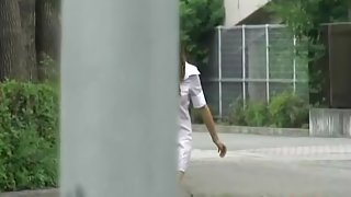 Hot Asian nurse gets a good street sharking outdoors.