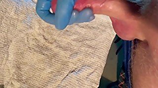 Guy jerks off with latex glove cumshot