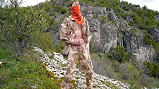 Soldier Wanks Himself On The Mountainside On A Warm Spring Day In The Northern Rocky Mountains