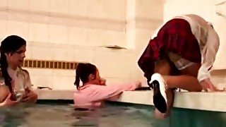 Three Hot Lesbians Playing In A Pool