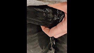 Pissing Black shorts and Sneakers