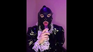 Sexy latex sissy maid sucks dildo and plays with chastity