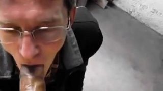 Old salesman blowing black cock in a hardware store