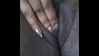 Wet ebony pussy rubbing while watching porn