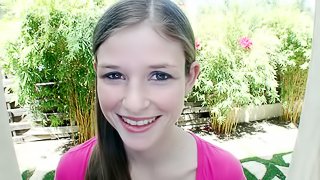 Cute teen Lara Brookes gives a nice handjob outdoors