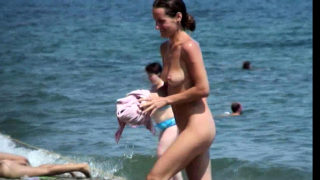 Voyeur girl naked on public beach