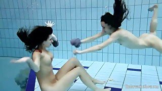 Swimming with sweet naked brunette teens