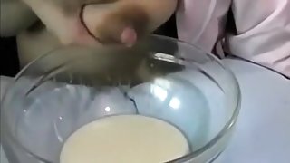 Wath my lactating wife milking her big boobs dry into a bowl