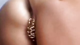 Heavy pierced MILF with 15 pierced pussy rings