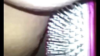 Pounding pussy with hairbrush