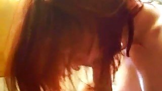 Red haired girl sucking hard pecker balls deep in amateur video