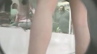 Girl browsing shops ends up in an upskirt street video