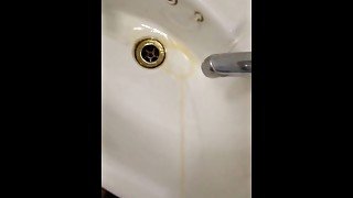 Pee in Men's Room Sink