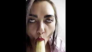 Deep blowjob to a banana, ending in her mouth...