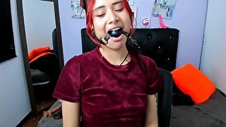 Cute Girl Drooling While Gagged With A Black Ball Gag