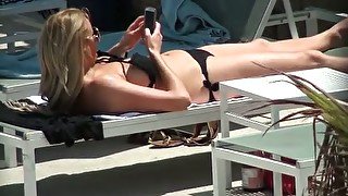 My buddy was peeking on charming sunbathing blonde sexpot on deck chair