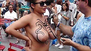 Latina gets bodypaint on her huge tits