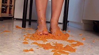 Close up of trampling food in the kitchen by Foot Girls