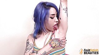 Blue hair Denise licks her body