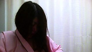 Long-haired Asian tart gets filmed while changing her tight