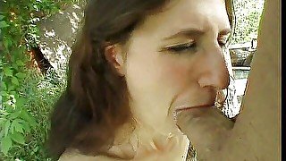 Lena sucking Brandon Irons' cock under a tree