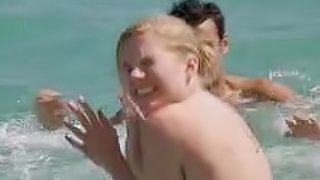 Sexy Eva Birthistle Wearing a Bikini on a Beach - 'A Fond Kiss' Scene