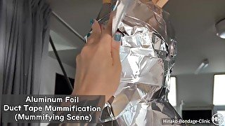 アルミニウムテープマミフィケーション(マミフィケーション制作シーン)　Aluminum Foil Duct Tape Mummification (Mummifying Scene)