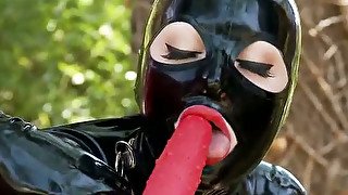 Horny fancy lady Paige Delight and her lusty kooky in latex suits make love outdoors