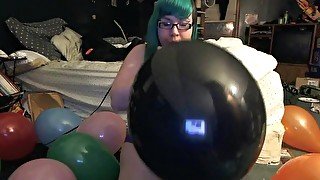 Chubby Teen Blowing and Popping Balloons