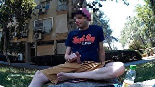 Kinky boy jerking off and cumming in public in front of apartment building in broad daylight