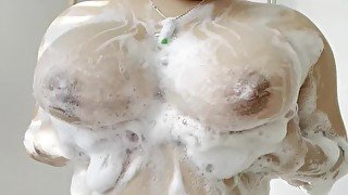 teen plays with big soapy titties while showering