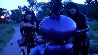 Public training of latex-clad femdom slaves gets really kinky