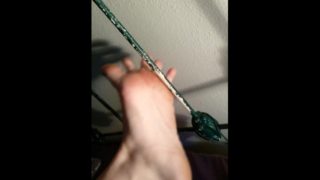 Sexy feet stretch and play on headboard