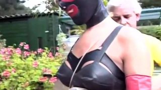 Masked slavegirl in the skillful hands of old bondage master