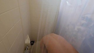 Dirty mechanic takes shower after hard day of work